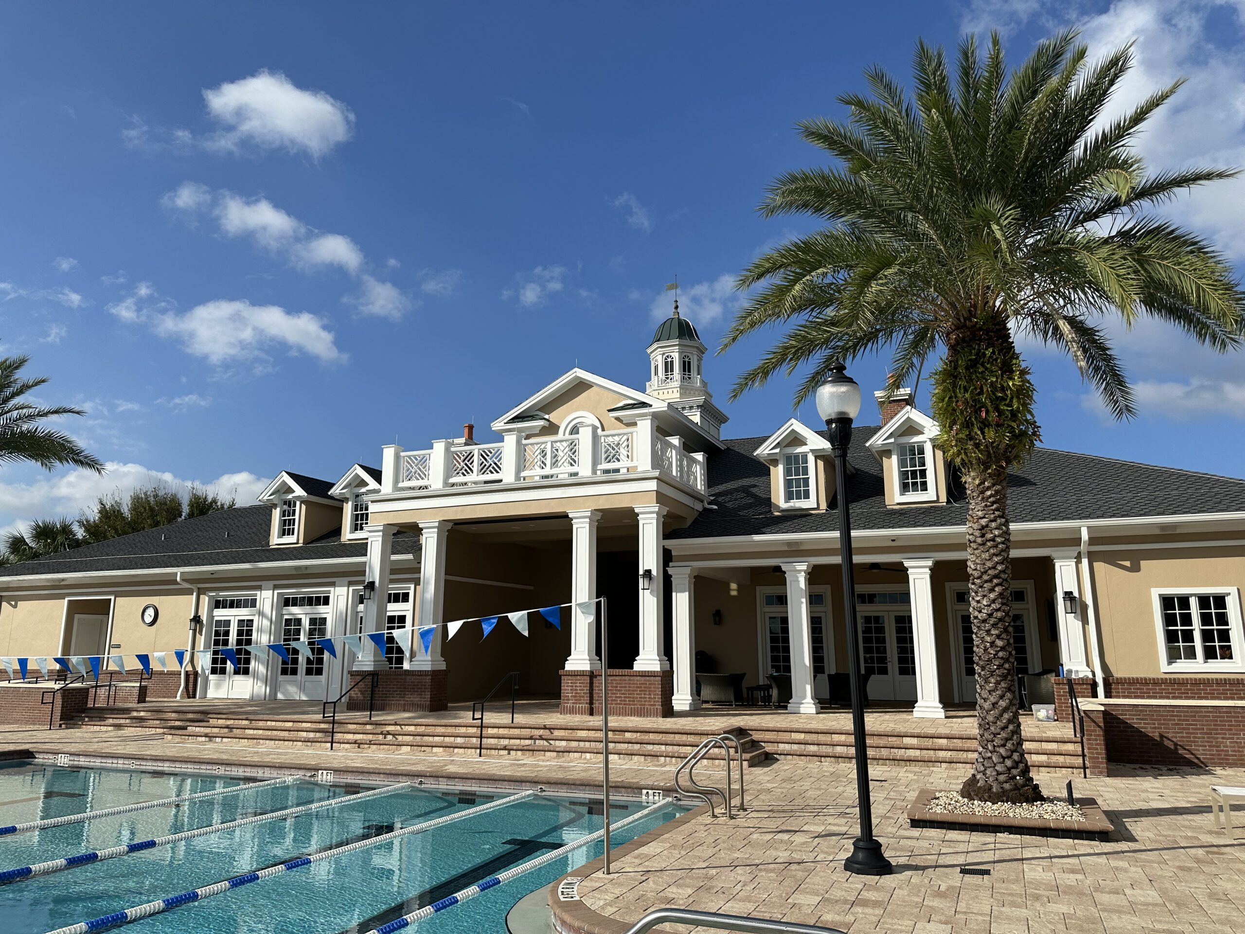 Poolside clubhouse — full repaint by Color Pros Painting