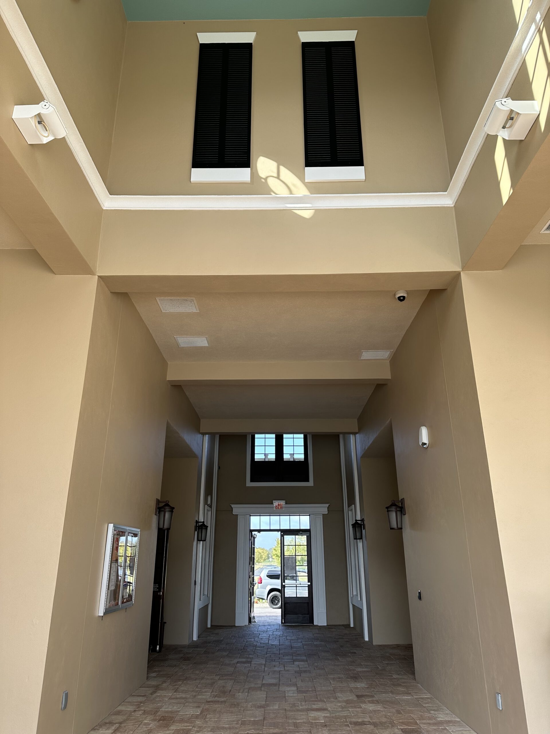 Tall entry hall — fresh neutral palette by Color Pros Painting