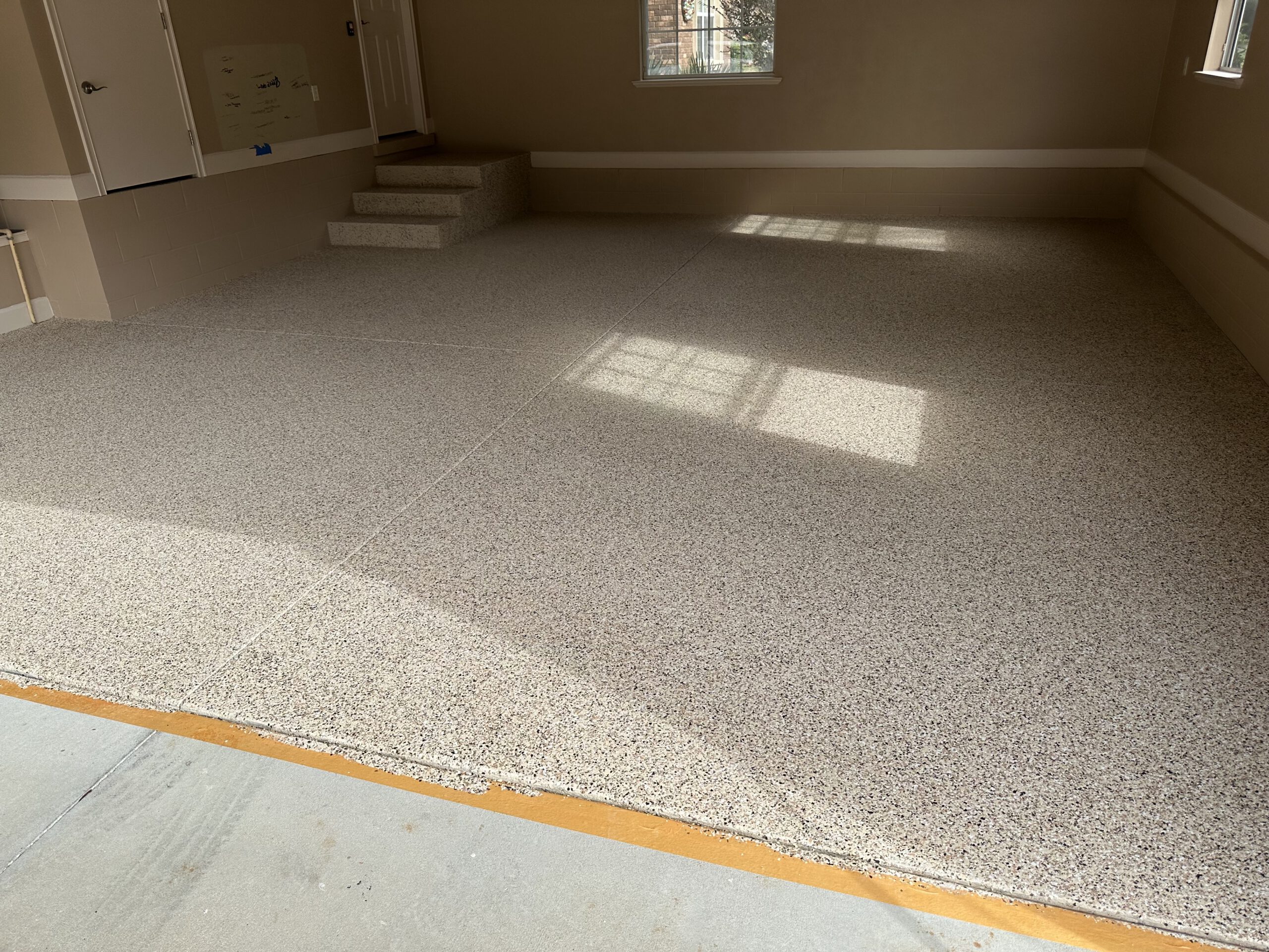 Full-flake floor, wall to wall by Color Pros Painting