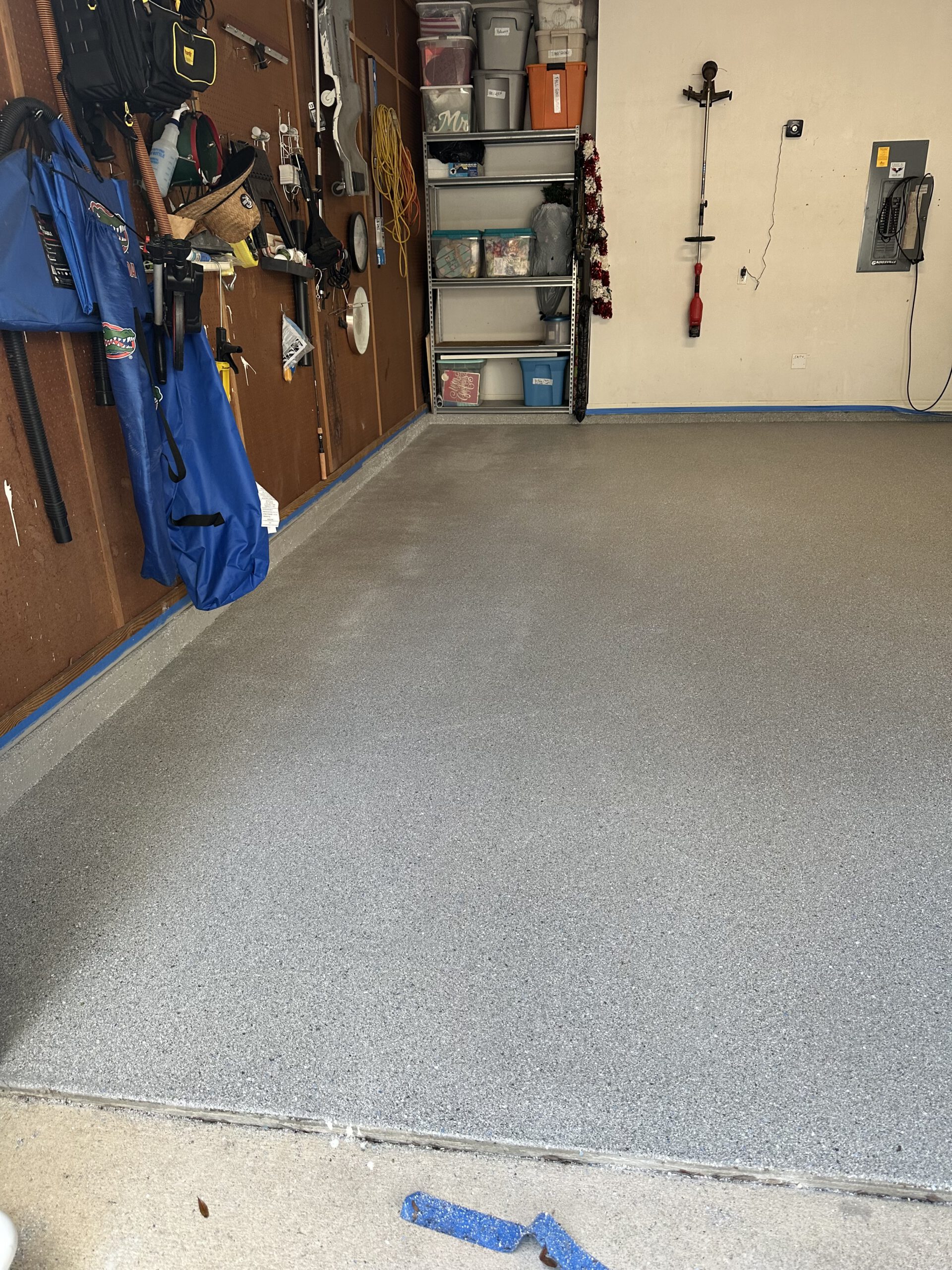 Garage floor — coated & sealed by Color Pros Painting