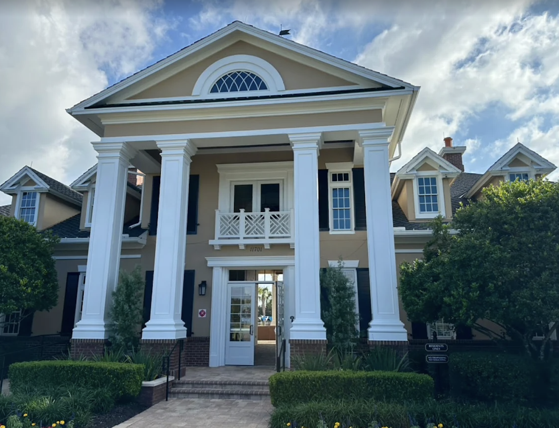 Grand entrance — columns and trim in crisp white by Color Pros Painting