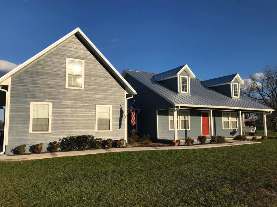 Exterior repaint — hardie board siding by Color Pros Painting