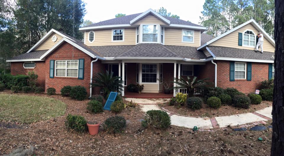 Full exterior repaint — two-story home by Color Pros Painting
