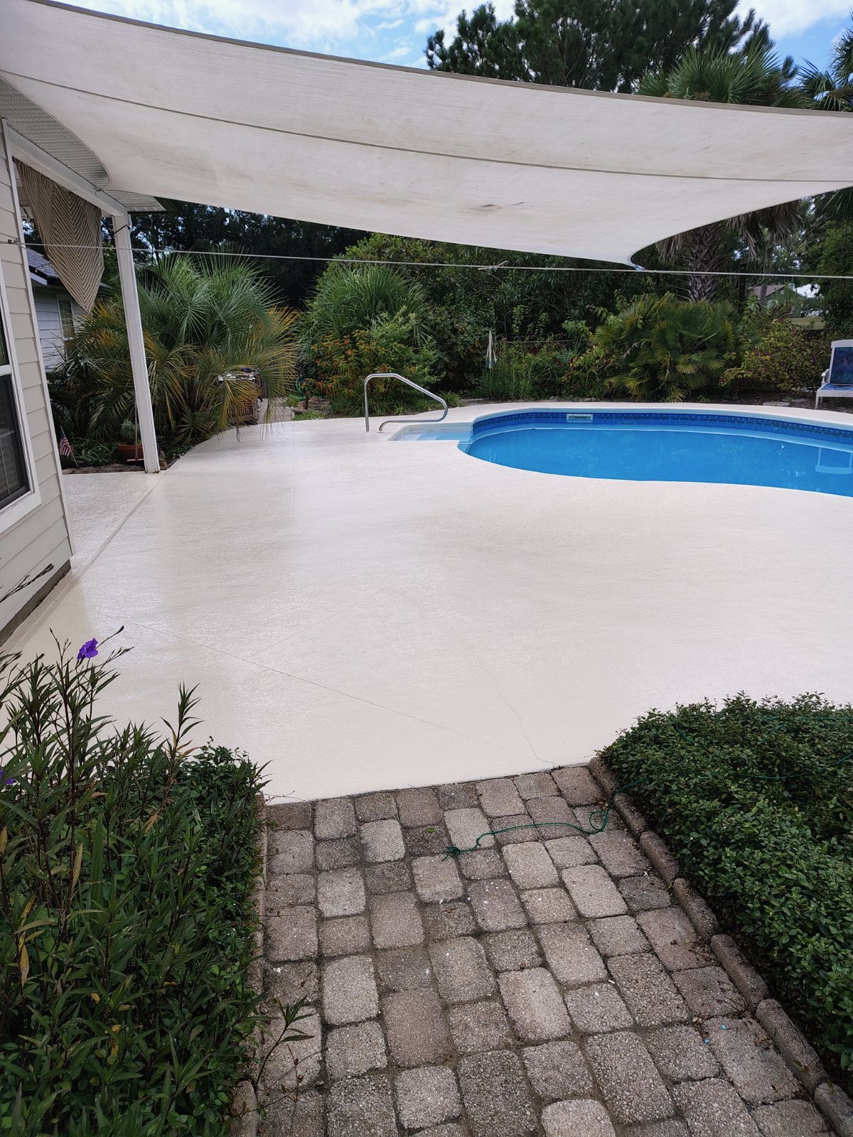 Pool deck — coated & sealed by Color Pros Painting