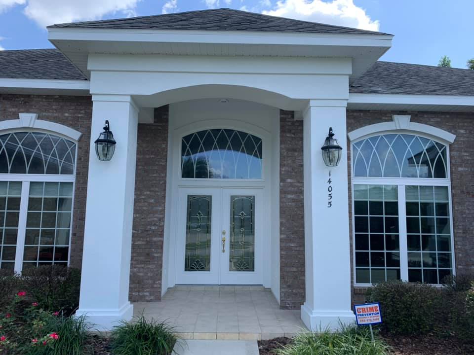 Entryway columns and trim — crisp white finish by Color Pros Painting